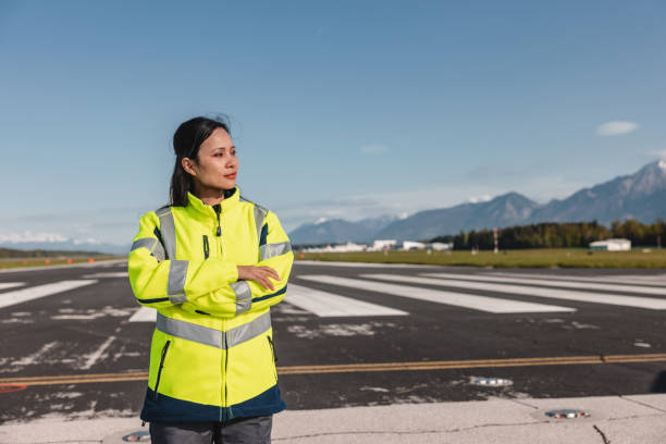istock Confident Female Aircraft Engineer Standing On The Airport Runway 1626762963