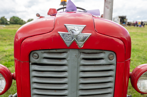 Low Ham.Somerset.United Kingdom.July 23rd 2023.A restored Massey Ferguson 35 tractor is on show at the Somerset steam and country show