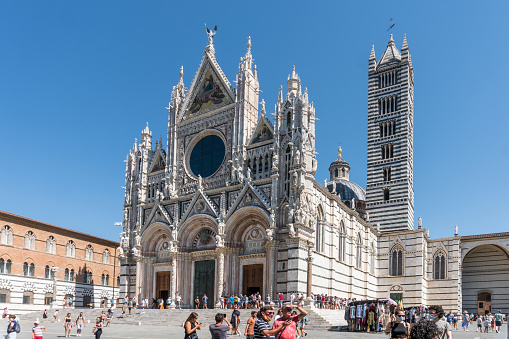 Siena ,Italy-august 10, 2020:View of the Cathedral of Siena destination of many tourists during a sunny day
