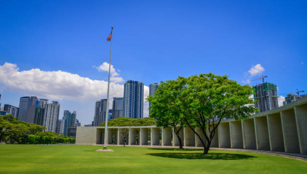 Manila American Cemetery and Memorial Manila, Philippines - Apr 13, 2017. View of Manila American Cemetery and Memorial in summer day. Cemetery honors the American and allied servicemen who died in World War II. taguig stock pictures, royalty-free photos & images