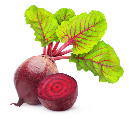 Fresh beetroot with leaves isolated on white.
