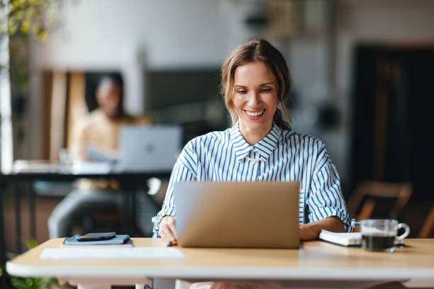 istock A Happy Beautiful Blonde Businesswoman Working On Her Computer 1626847852