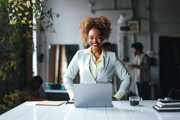 istock A Beautiful Blonde Cuban Businesswoman Looking At Camera While Working On Her Computer 1626848392
