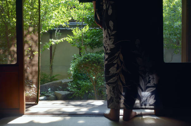 istock Woman Standing at Japanese Styled Balcony/ in Back Light 1626851576