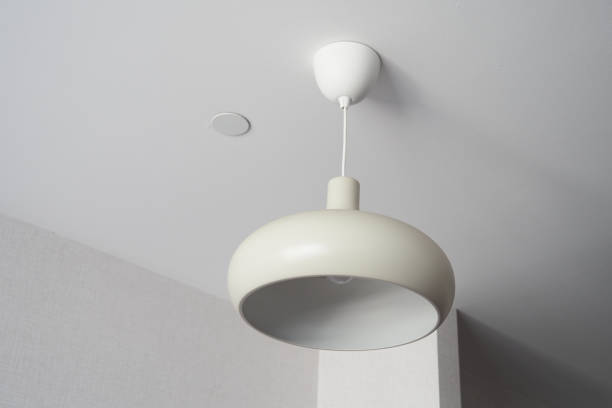 istock gray ceiling lamp hanging in a room , 1626857676