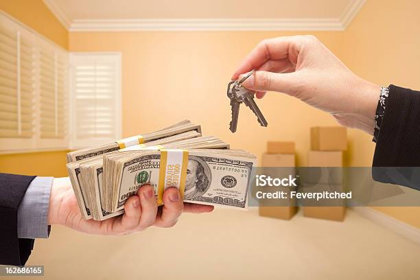 Handing Over Cash For House Keys Stock Photo - Download Image Now - Abundance, Apartment, Architecture