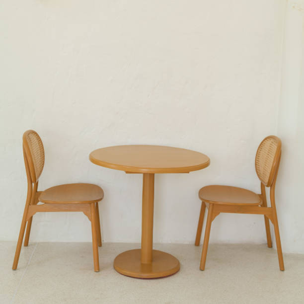istock Wooden table with chairs in the coffee shop 1626867899
