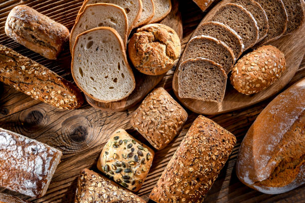 istock Assorted bakery products including loaves of bread and rolls 1626870531