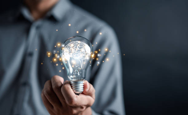 istock Man hand holding lightbulb start new idea and learning educate and graduation concept. study knowledge to creative thinking idea and problem solving solution in corporate business strategy. 1626874288