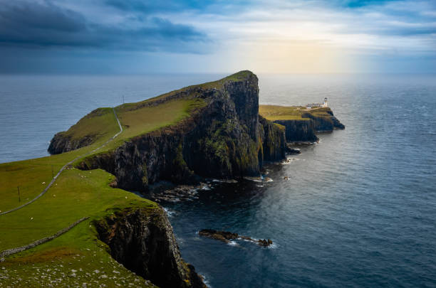 istock Dramatic Sunset at Neist Point Lighthouse, Skye, Scotland, UK 1626904715