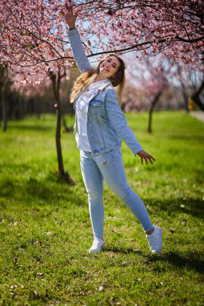 istock Pakistani young woman in a park, springtime 1626909471