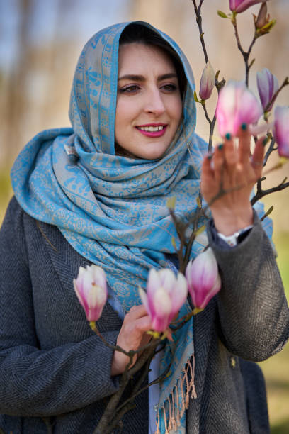 istock Pakistani young woman in a park, springtime 1626909980