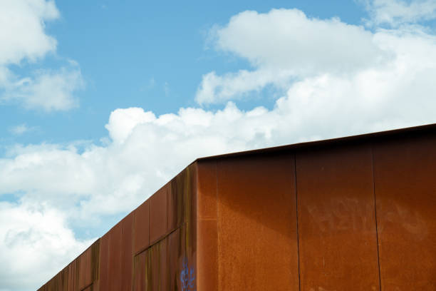 istock A rust-red building rises against the blue sky 1626950131