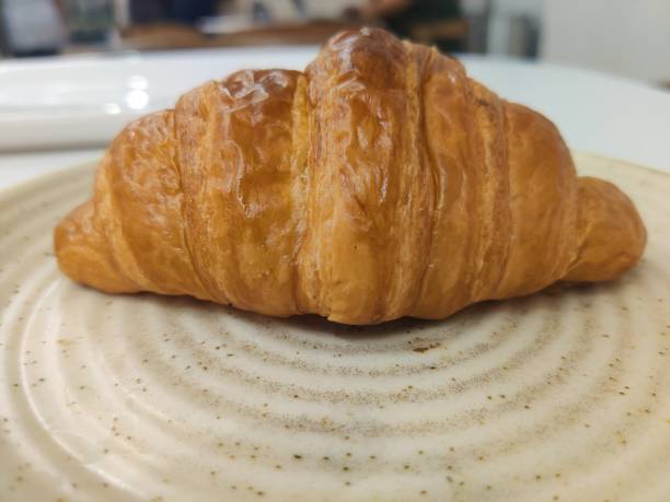istock Croissant at a Cafe- stock photo 1626952814