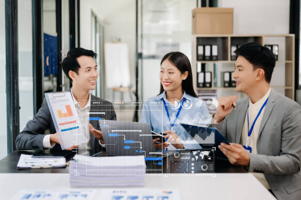istock Businessman team hand Project manager working and update tasks and Gantt chart scheduling virtual diagram.with smart phone, tablet and laptop 1627009752