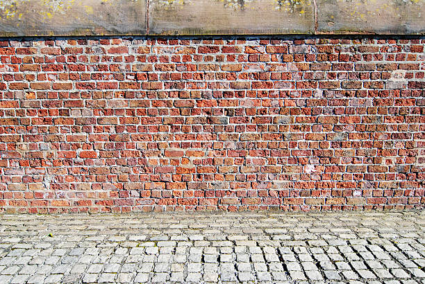 istock Red brick wall with sidewalk at the Albert Dock, Liverpool 162703517