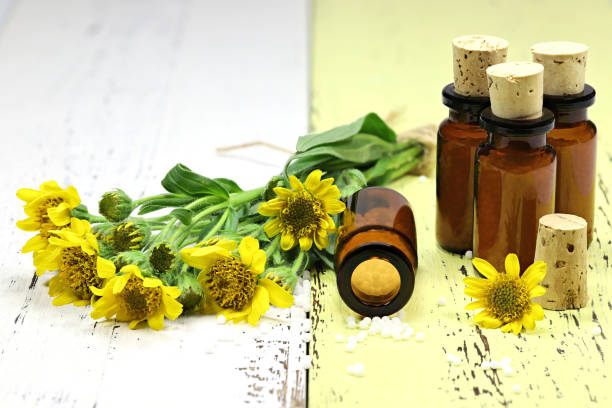 homeopathic arnica pills in brown bottles