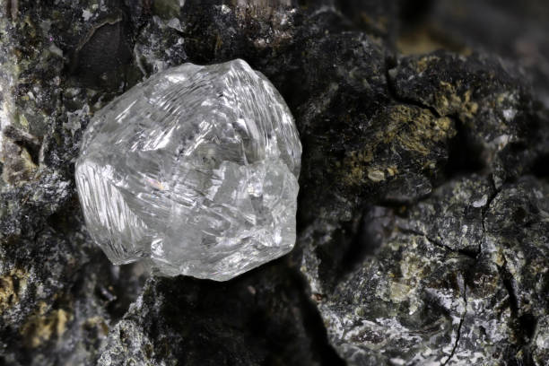 istock natural diamond nestled in kimberlite 1627047719