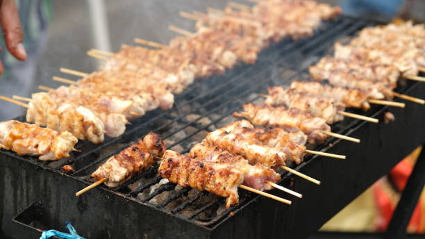 istock Grilled lamb satay on a charcoal grill. 1627047750