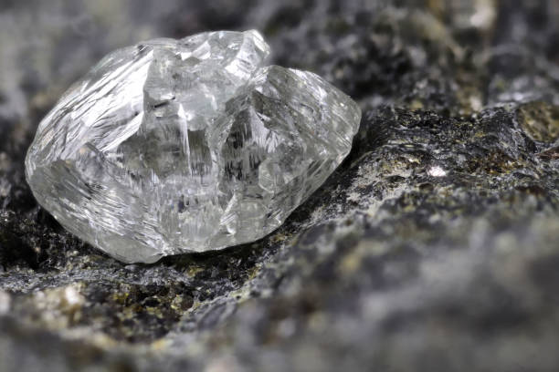istock natural diamond nestled in kimberlite 1627047772