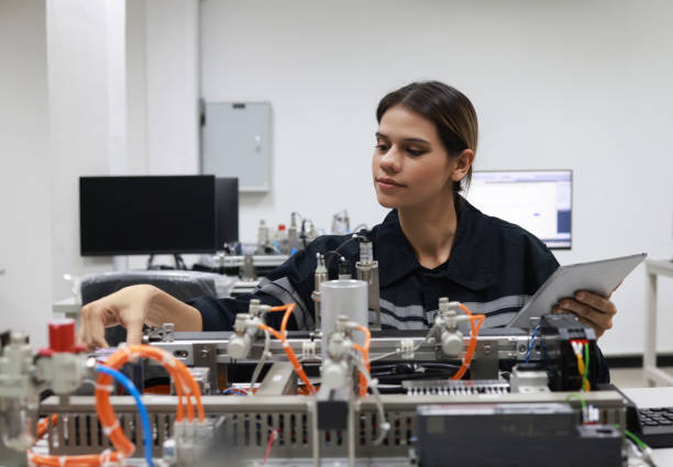 istock Female mechatronic   engineer with expertise in prototype automatic, learning AI automation system 1627053994