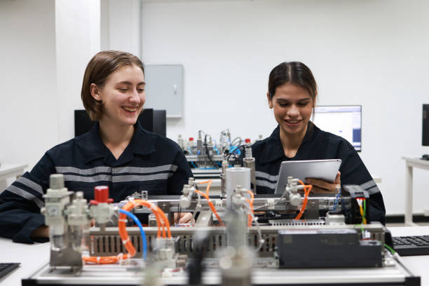 istock Two female mechatronic   engineer with expertise in prototype automatic, learning AI automation system 1627053996
