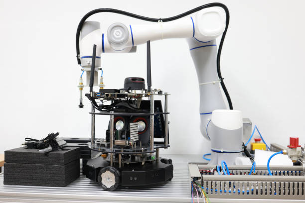 istock the Smart small robot arm is used for an automation production system. 1627055173