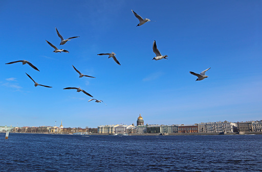 Bright spring view with water and embankment in the tourist center of famous old city.