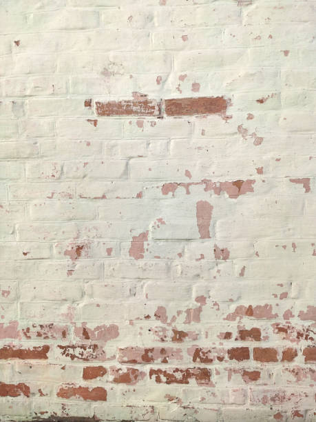 istock Old brick yellow background texture. Porous brick wall in temple 1627064428