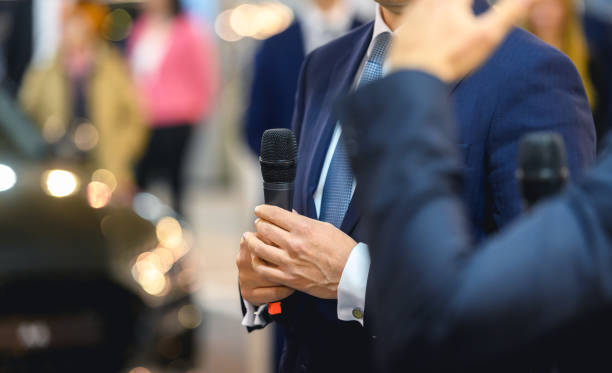 istock Businessman at the press conference 1627068384