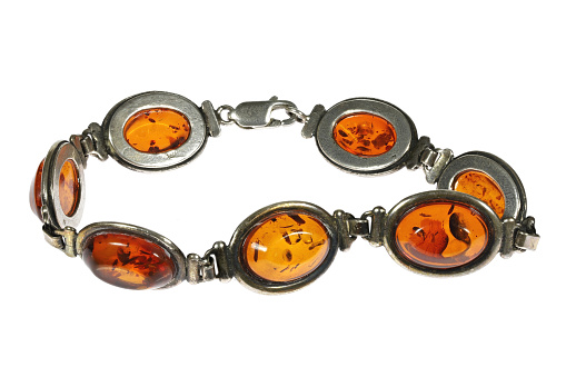 sterling silver amber bracelet isolated on white background