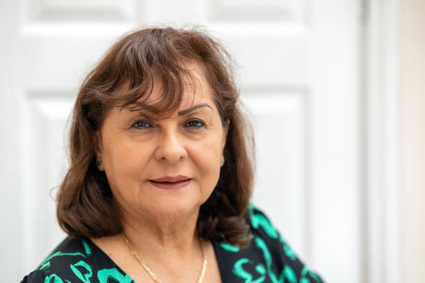 istock Senior Hispanic woman headshot 1627106265