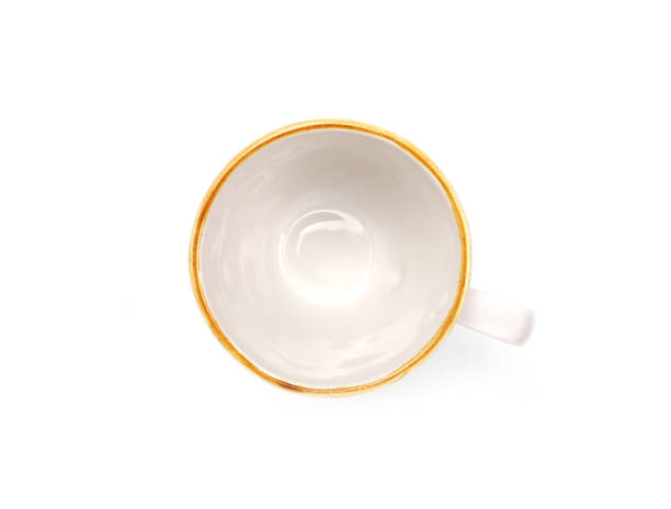 istock Empty white mug with brown rim isolated on white background. Use for home or restaurant, food design. 1627131181