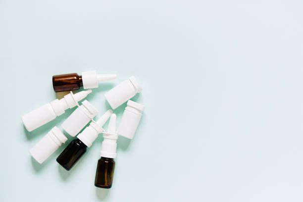 istock Set of different white medicine bottles, pill bottles without label design, copy space on blue background 1627133978