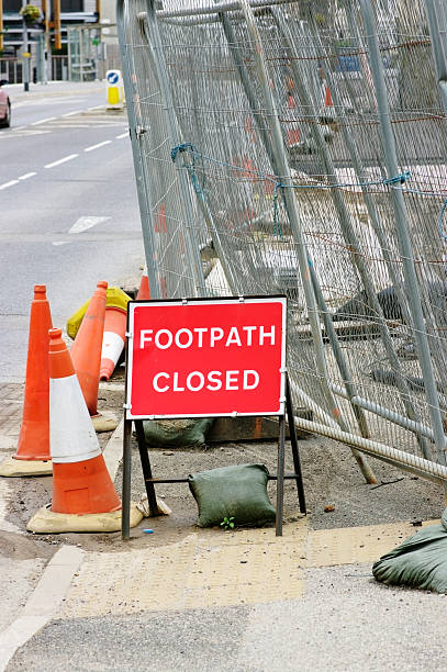 istock Footpath Closed Sign By Construction Site Fence 162714823