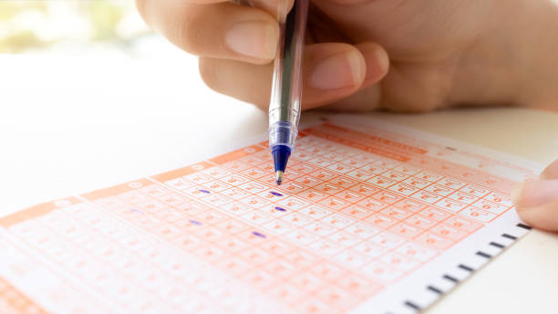 istock Making prediction by choosing numbers on a Lotto ticket. 1627151070