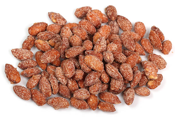 Sugared Cinnamon Almonds Sugared Cinnamon Almonds candied fruit stock pictures, royalty-free photos & images