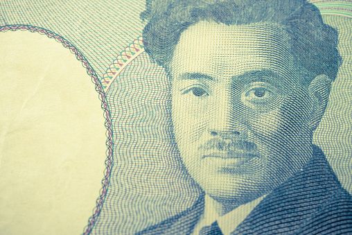 Close up macro of Hideyo Noguchi on 1000 Japanese yen banknote texture background. Concept of Japanese yen payment currency of Japan, Forex investment, stock market or asia, global financial economic