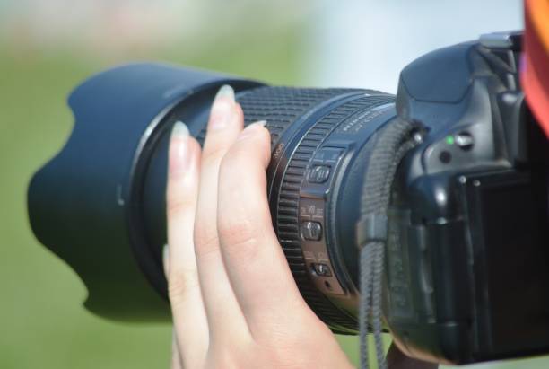istock Girl photographer 1627188685