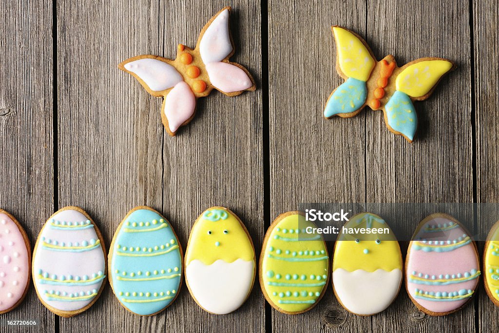 Easter homemade gingerbread cookie Easter homemade gingerbread cookie over wooden table Animal Stock Photo