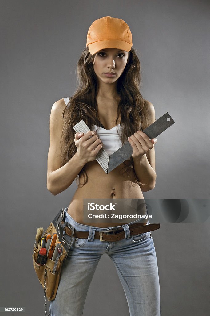 sexy young woman construction worker Adult Stock Photo