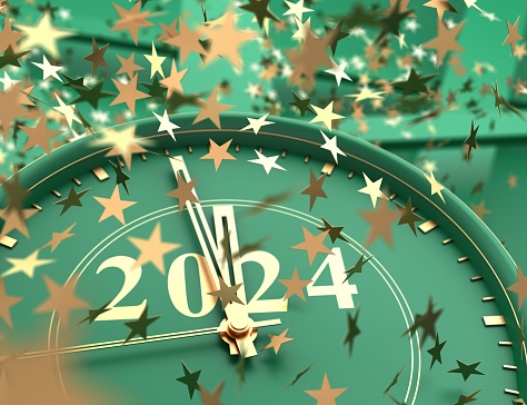 Celebrating the new year 2024,clock showing last Minutes to the new year and star shaped confetti start falling