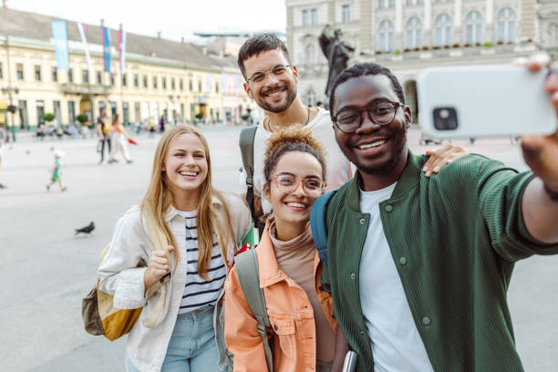 istock Young man is taking a selfie with his University friends 1627221394