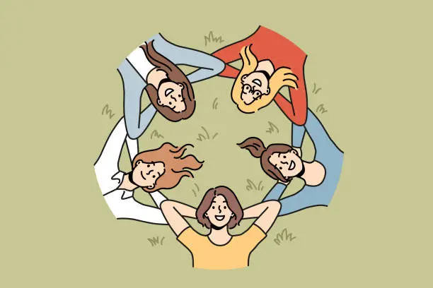 Vector illustration of Group of girls lies on grass and looks up smiling enjoying vacation in park in hot summer weather