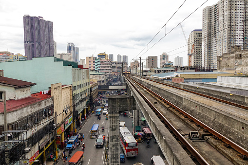 Manila, Philippines - Dec 20, 2015. LRT railtrack at EDSA train station in Manila, Philippines. LRT serves 579,000 passengers each day.