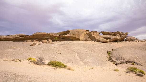 istock Rock formations in a totally flat sandy landscape in the Erongo region, Namibia. 1627269808