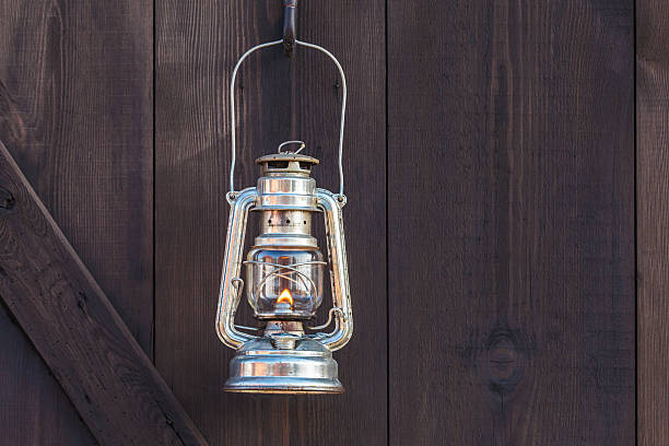 istock Old fashioned lantern on an wooden wall 162729394