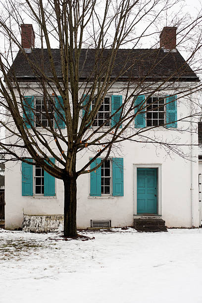 old empty house during winter stock photo