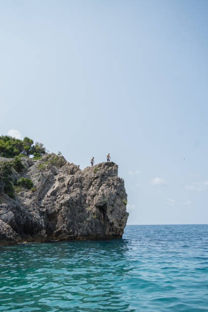View across water to cliff