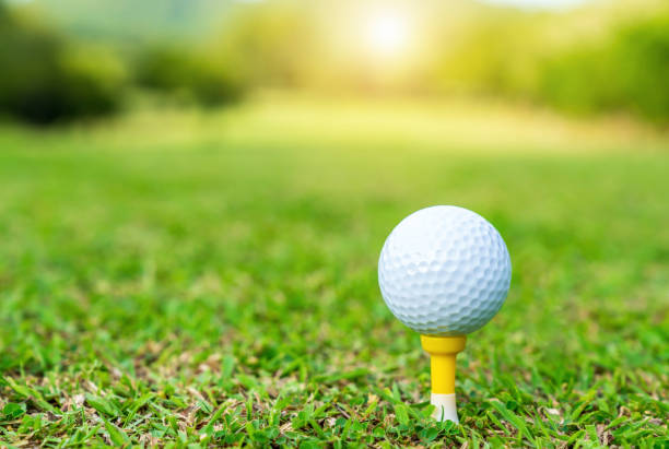 istock golf ball on tee ready to play. 1627315190